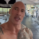 Dwayne the Rock Johnson stands in the iron paradise gym.